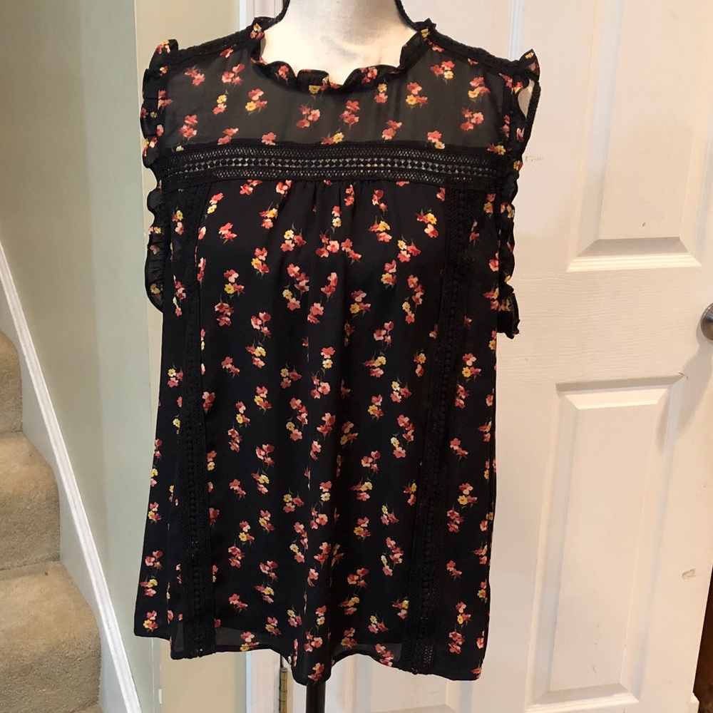 Beautiful, flowy, sleeveless blouse
